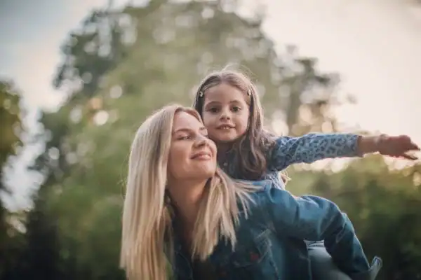 happy mum and daughter following mediation to resolve parental alienation Greater Manchester